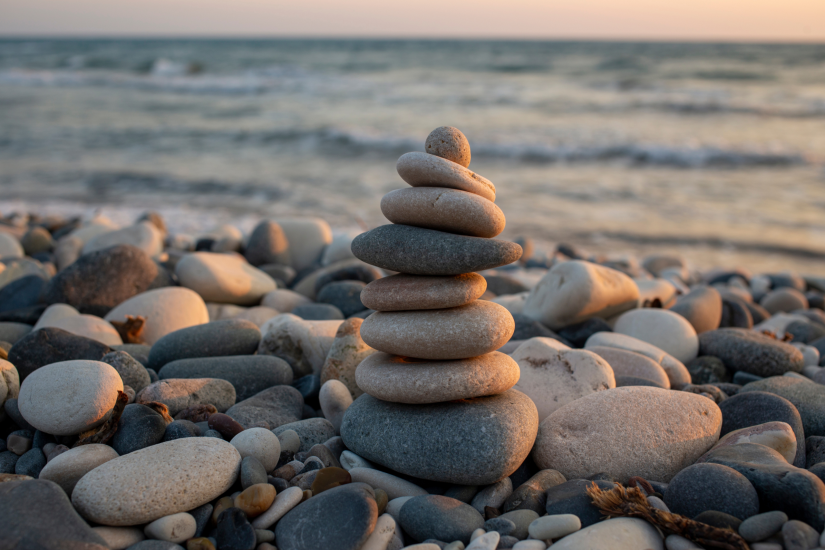 Stacked pebbles by the beach